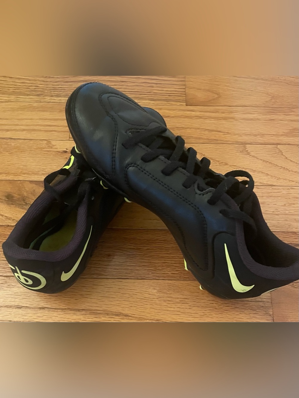 Nike Kids Black Soccer Cleats with Neon Yellow Accents